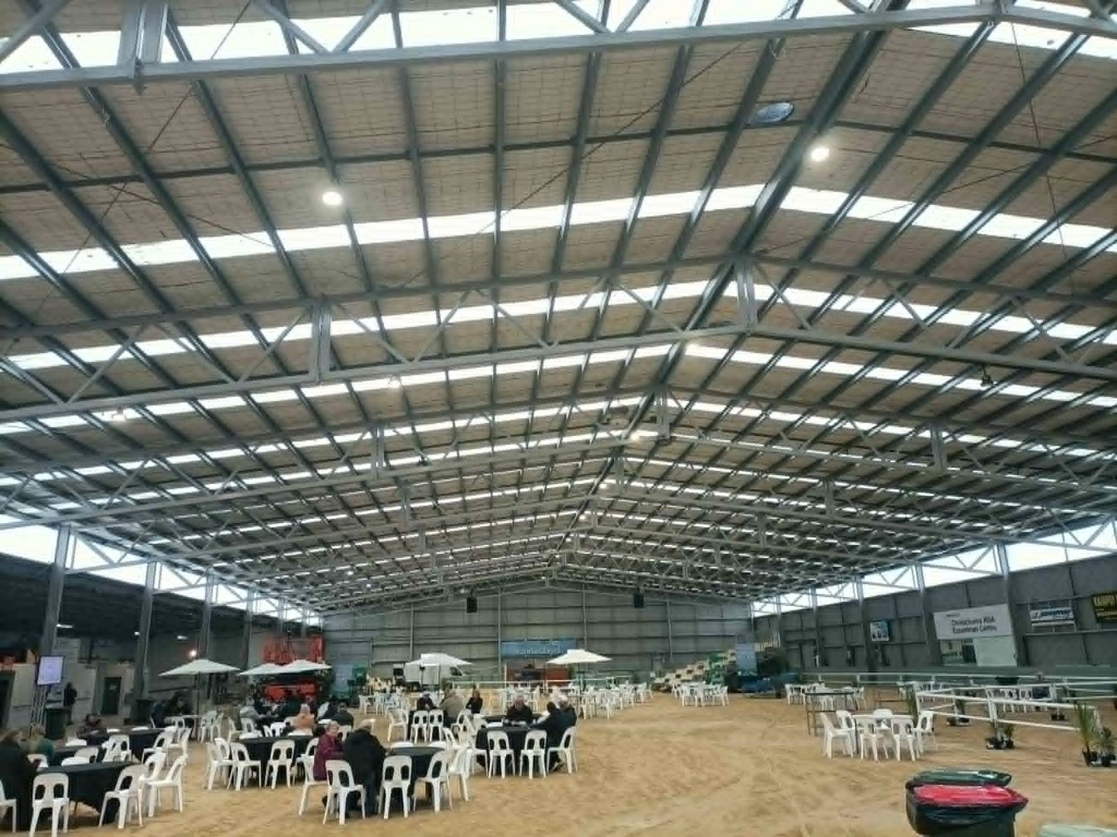 Tables and seating set up in the arena for a sales event